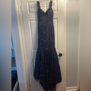 Panoply navy blue mermaid style prom dress with a corset top